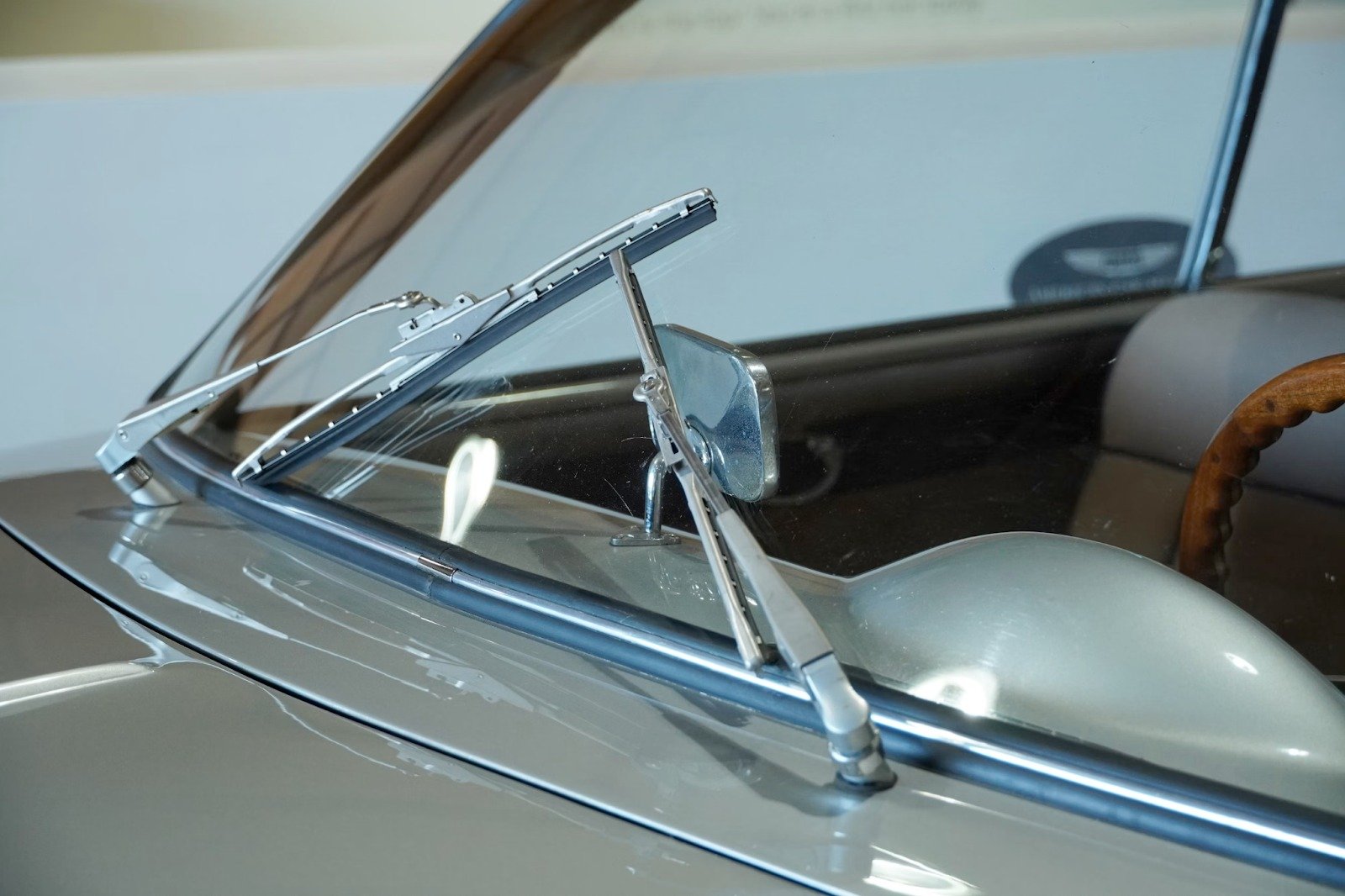 A close-up of a freshly replaced front car windshield